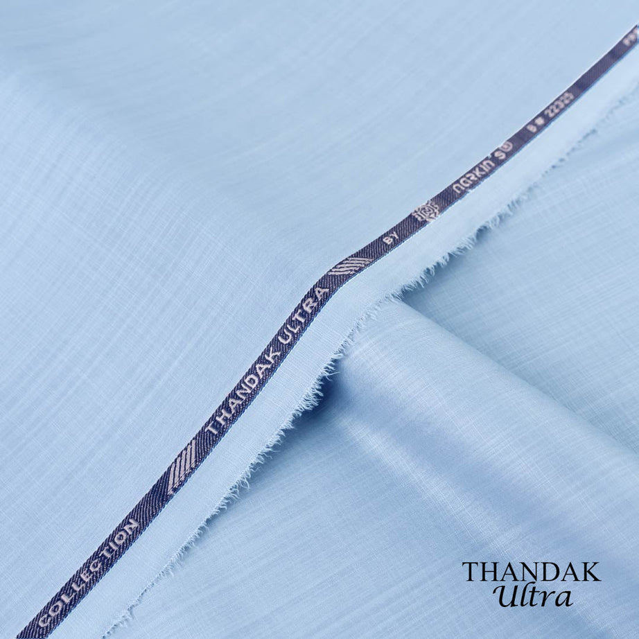 Lightweight Thandak Ultra fabric with slubby linen-like texture, micro polyester wash and wear summer fabric